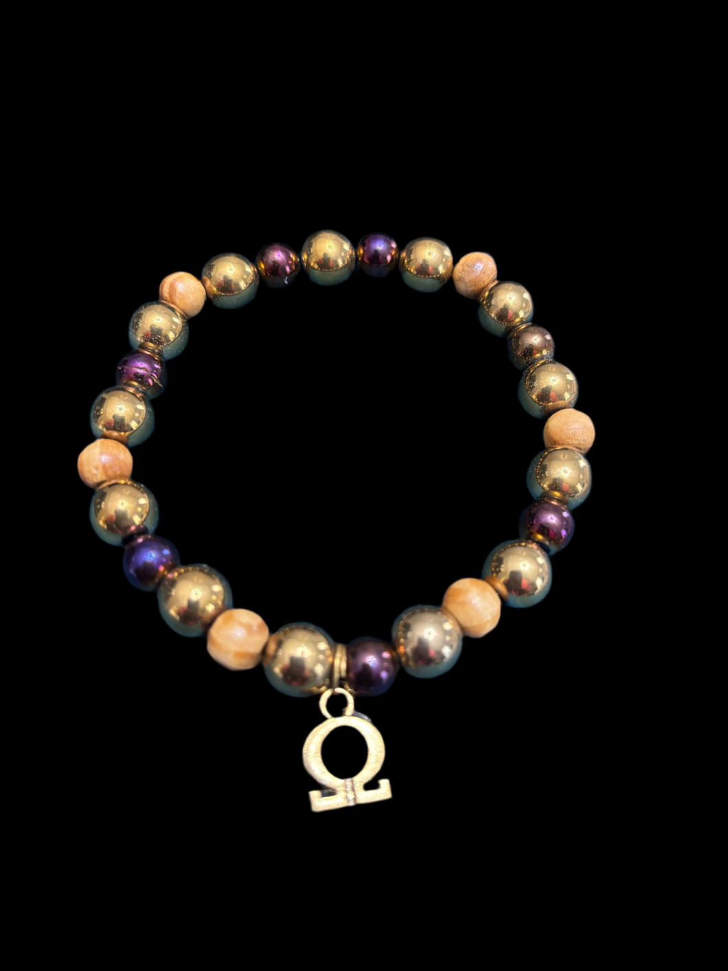 Purple Hematite, Gold Hematite, and wooden beaded bracelet with Omega charm